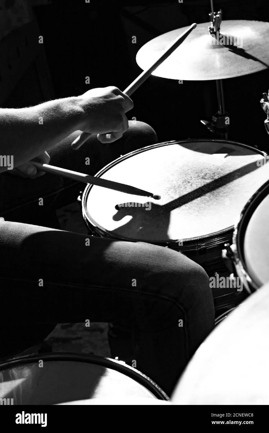 Drummer beats drums with drumsticks, closeup photo Stock Photo Alamy