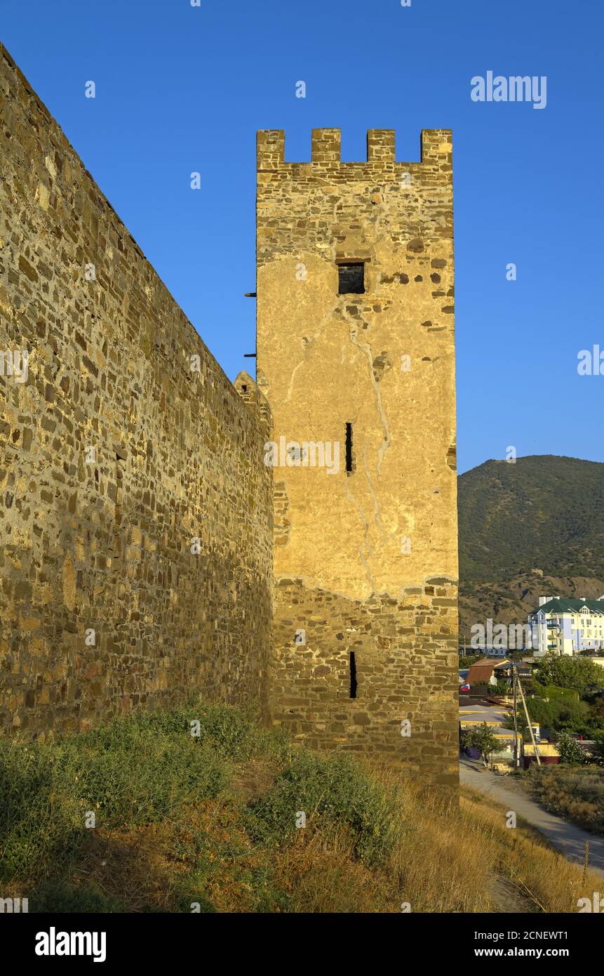 Genoese fortress in Sudak. Tower and fragment of the wall Stock Photo