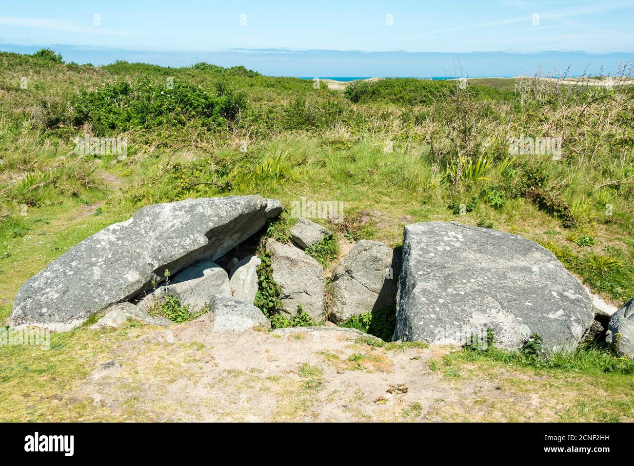 Robert's Cross is a Neolithic burial chamber (dolmen) on the north end of Herm Island, Guernsey, in the Channel Islands, UK. Stock Photo