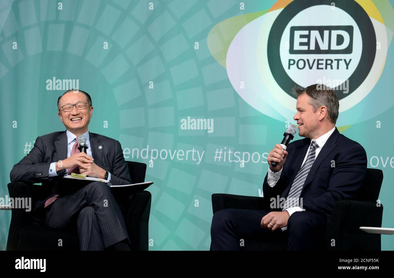 Actor and social activist Matt Damon (R) makes remarks during a discussion with World Bank Group President Jim Yong Kim to promote his organization for universal clean water and sanitation as part of the IMF and World Bank's 2017 Annual Spring Meetings, in Washington, U.S., April 20, 2017.   REUTERS/Mike Theiler Stock Photo