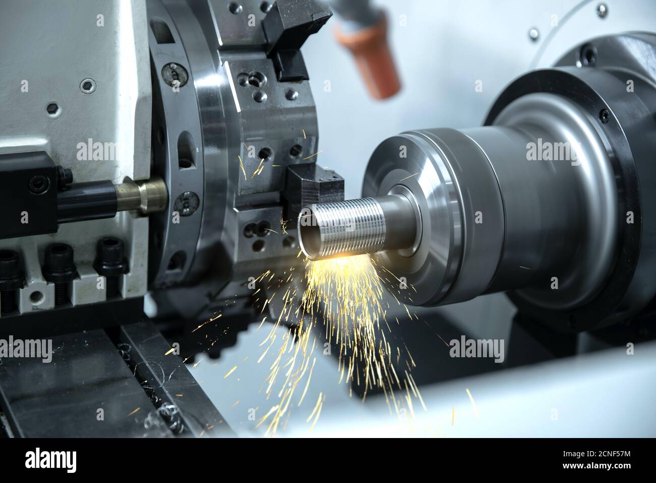 Cutting tool metalworking in manufacturing process by machining. Stock Photo