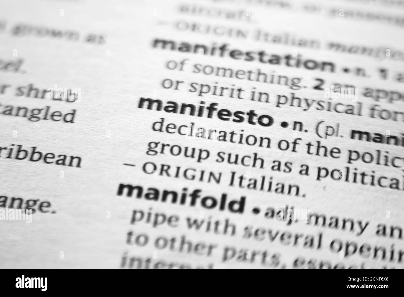 Word or phrase Manifesto in a dictionary Stock Photo