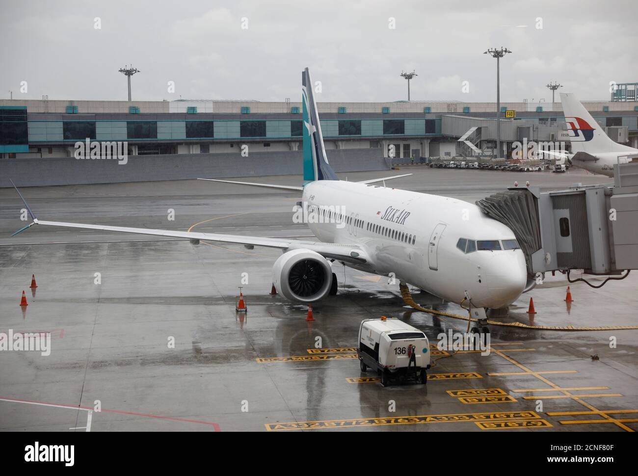 SilkAir's new aircraft, the Boeing 737 Max 8, sits on the tarmac at Changi Airport in Singapore October 4, 2017. REUTERS/Edgar Su Stock Photo