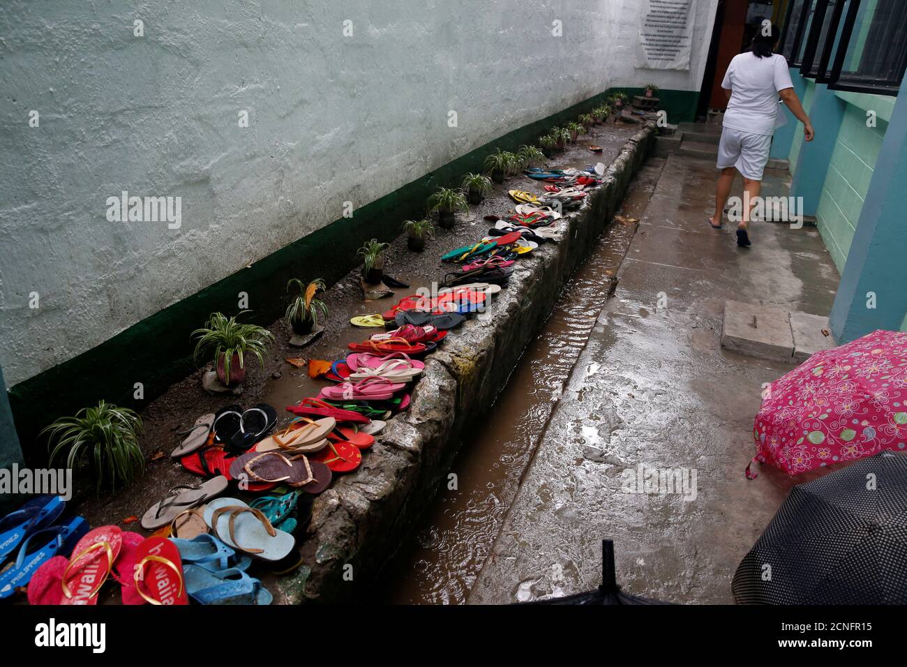Slippers of patients undergoing drug rehabilitation are pictured outside a  dormitory at a government run rehab center in Taguig, Metro Manila,  Philippines December 12, 2016. REUTERS/Erik De Castro Stock Photo - Alamy