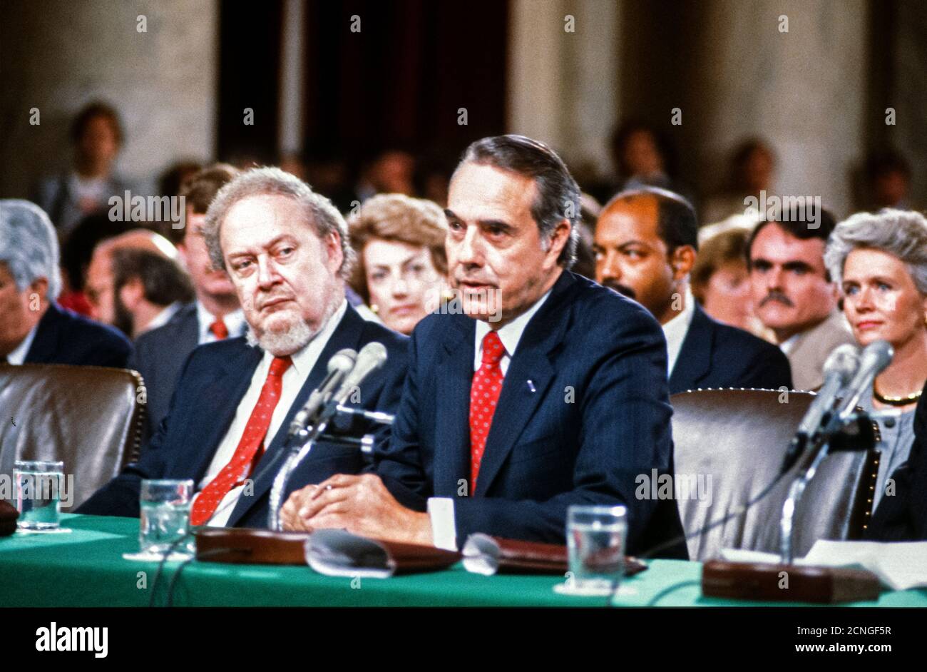United States Senate Minority Leader Bob Dole (Republican of Kansas), right, introduces Judge Robert Bork, left, during the US Senate Committee on the Judiciary confirmation hearing on Bork's nomination by US President Ronald Reagan, as Associate Justice of the Supreme Court to succeed Justice Lewis Powell, who is retiring, in Washington, DC on September 15, 1987.Credit: Arnie Sachs/CNP | usage worldwide Stock Photo