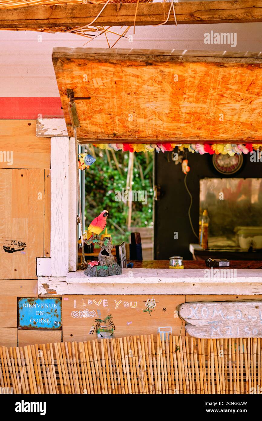 A rustic summer beach bar cafe shack / cabana counter in Corsica France - Corsica beach cafe - beach bar Stock Photo