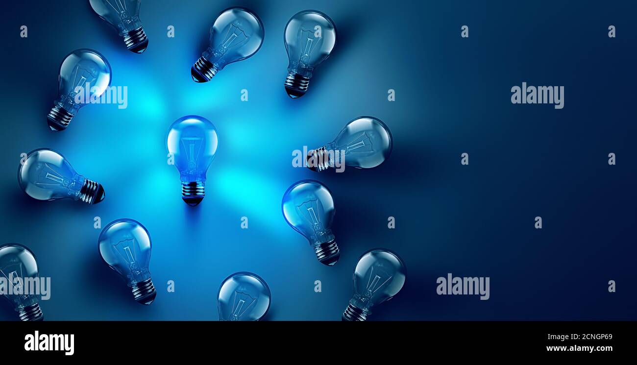 Idea concept image with luminous light bulb Stock Photo