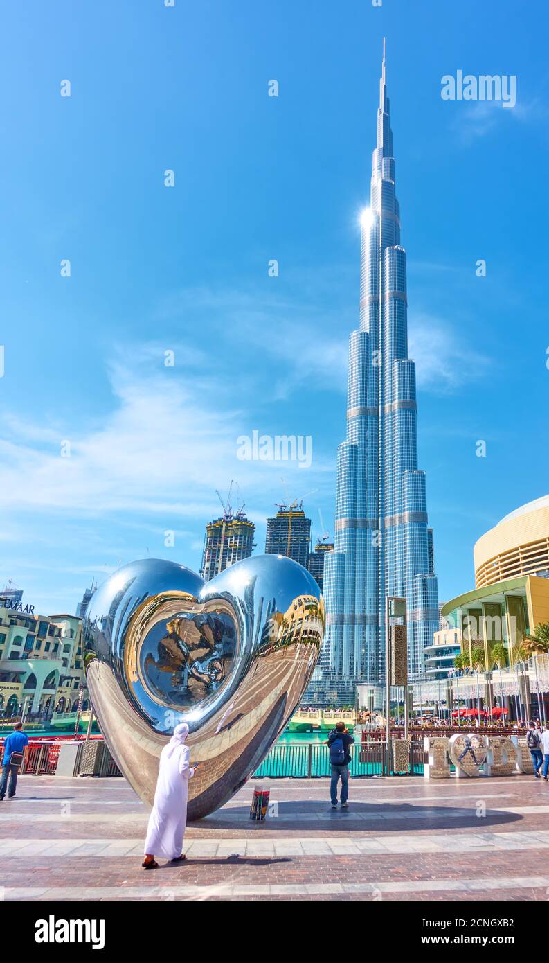 Dubai, UAE - January 30, 2020: The Dubai Steel Heart - Modern sculpture next to Burj Khalifa building and Dubai Mall, United Arab Emirates Stock Photo