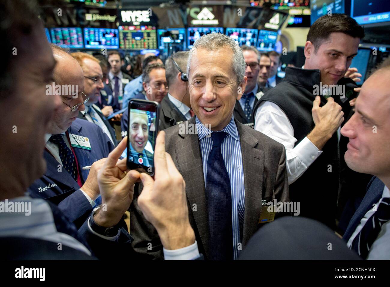 Shake Shack founder Danny Meyer is photographed during his company's IPO on the floor of the New York Stock Exchange January 30, 2015. Shares of gourmet hamburger chain Shake Shack Inc soared 150 percent in their first few minutes of trading on Friday, valuing the company that grew out of a hotdog cart in New York's Madison Square Park at nearly $2 billion. REUTERS/Brendan McDermid (UNITED STATES - Tags: BUSINESS FOOD) Stock Photo