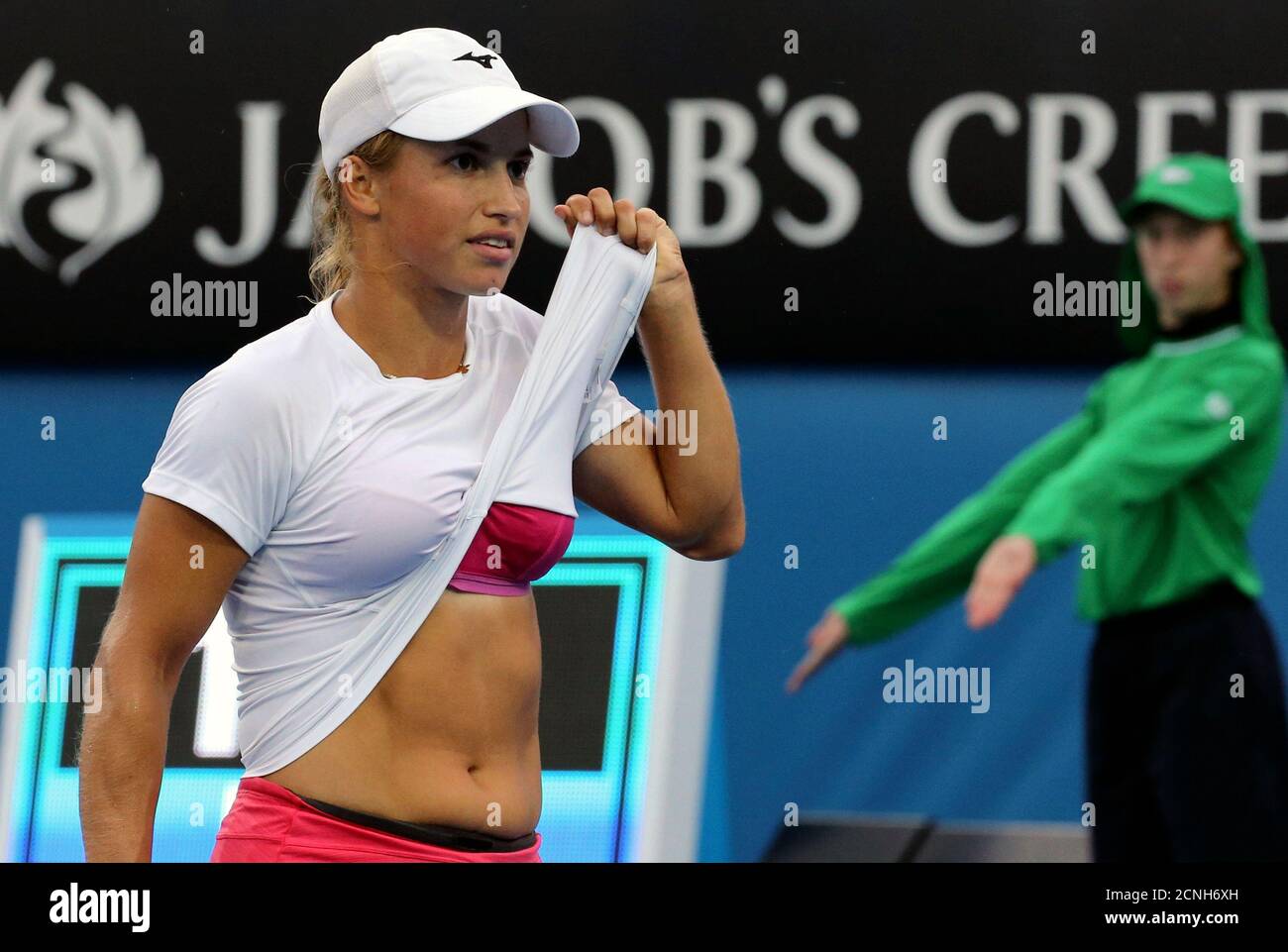 A Ball Boy Watches As Kazakhstan S Yulia Putintseva Lifts Her Shirt During Her Third Round Match Against Russia S Margarita Gasparyan At The Australian Open Tennis Tournament At Melbourne Park Australia January 22
