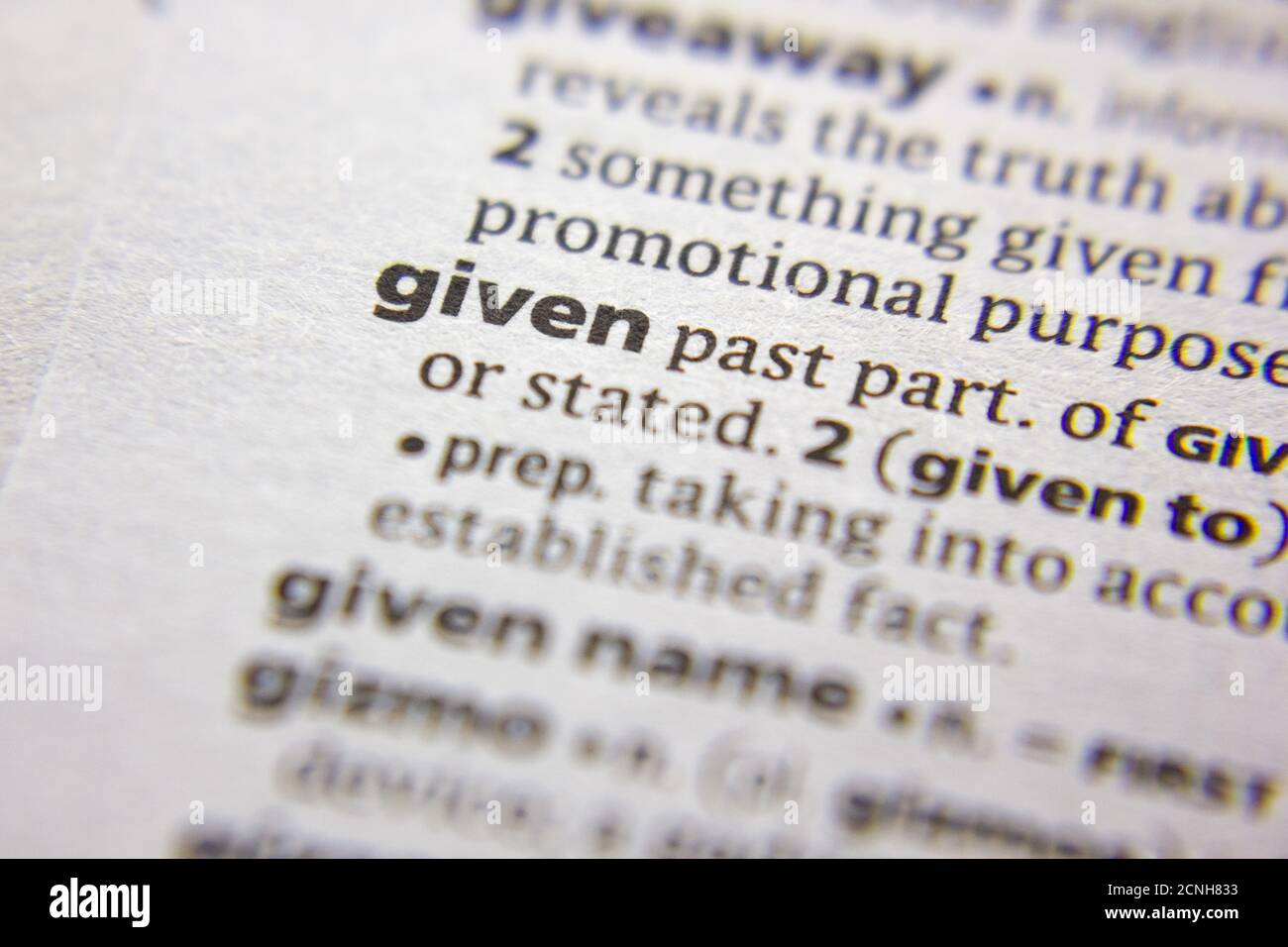 Word or phrase Given in a dictionary Stock Photo - Alamy