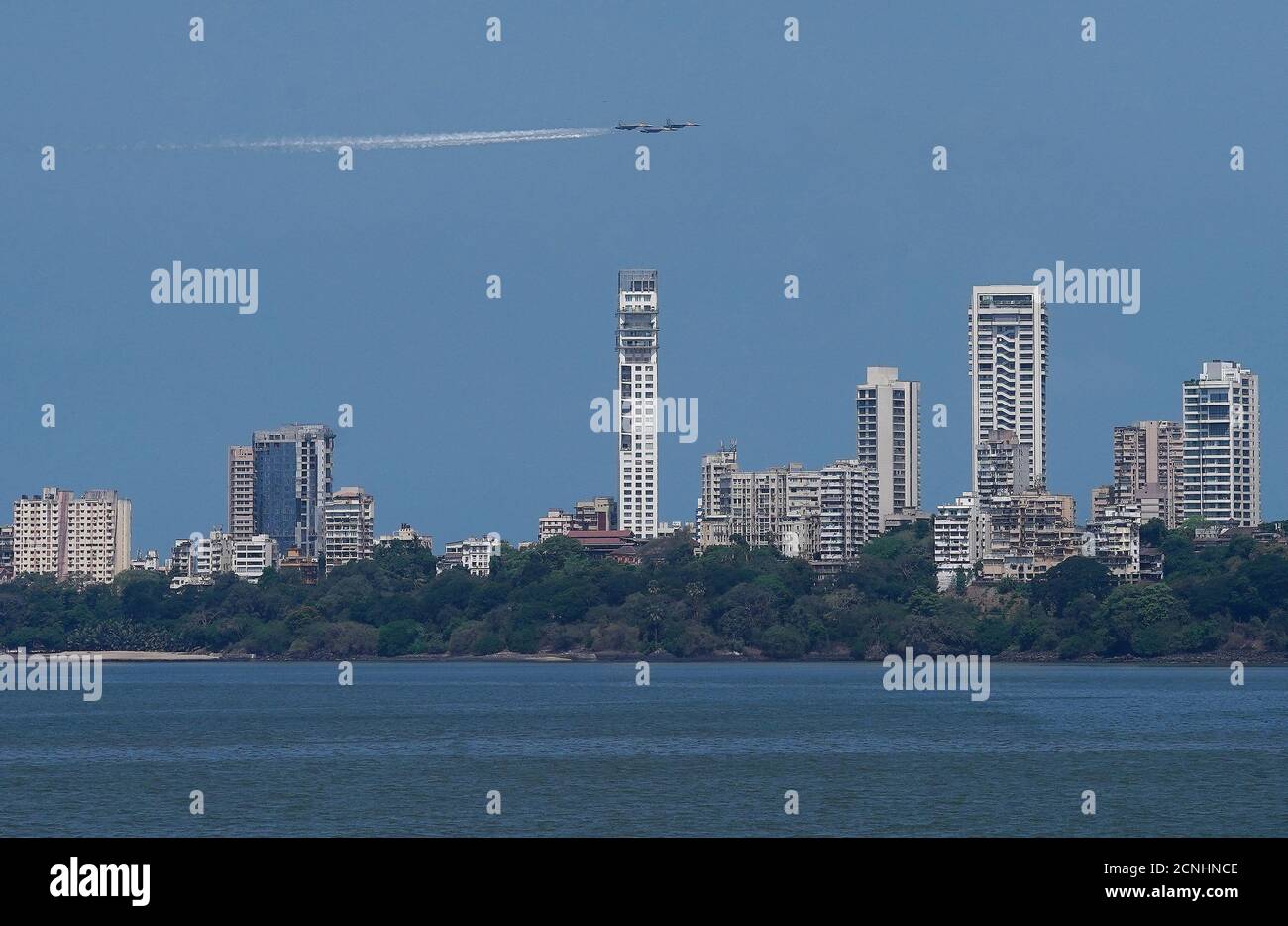 Indian Air Force (IAF) Sukhoi Su-30MKI fighter jets fly past Marine Drive  as part of an event to show gratitude towards the frontline warriors  fighting the coronavirus disease (COVID-19) outbreak, in Mumbai,