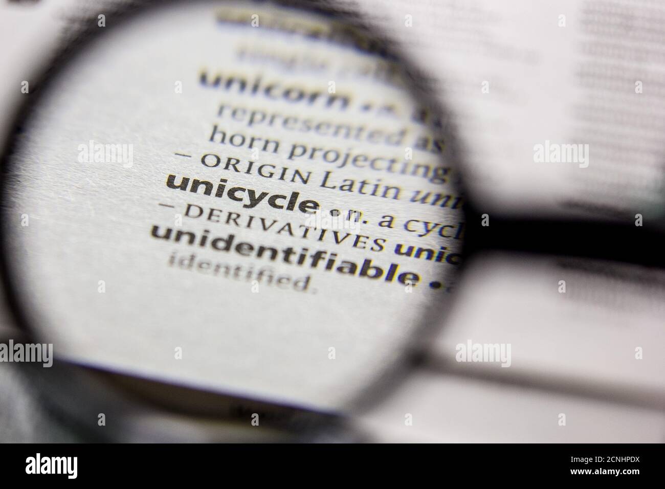 Word or phrase Unicycle in a dictionary Stock Photo Alamy