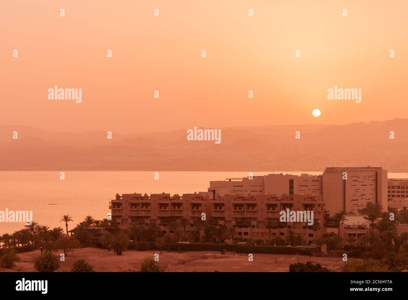 Coastal cityscape of Aqaba city at sunset, bird eye view Stock Photo