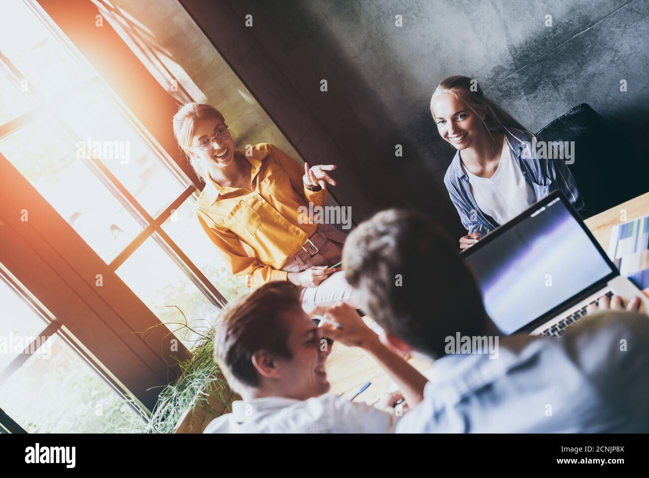 Group of Diverse Designers Having a Meeting Concept. Team of graphic designers having a meeting in office. Stock Photo