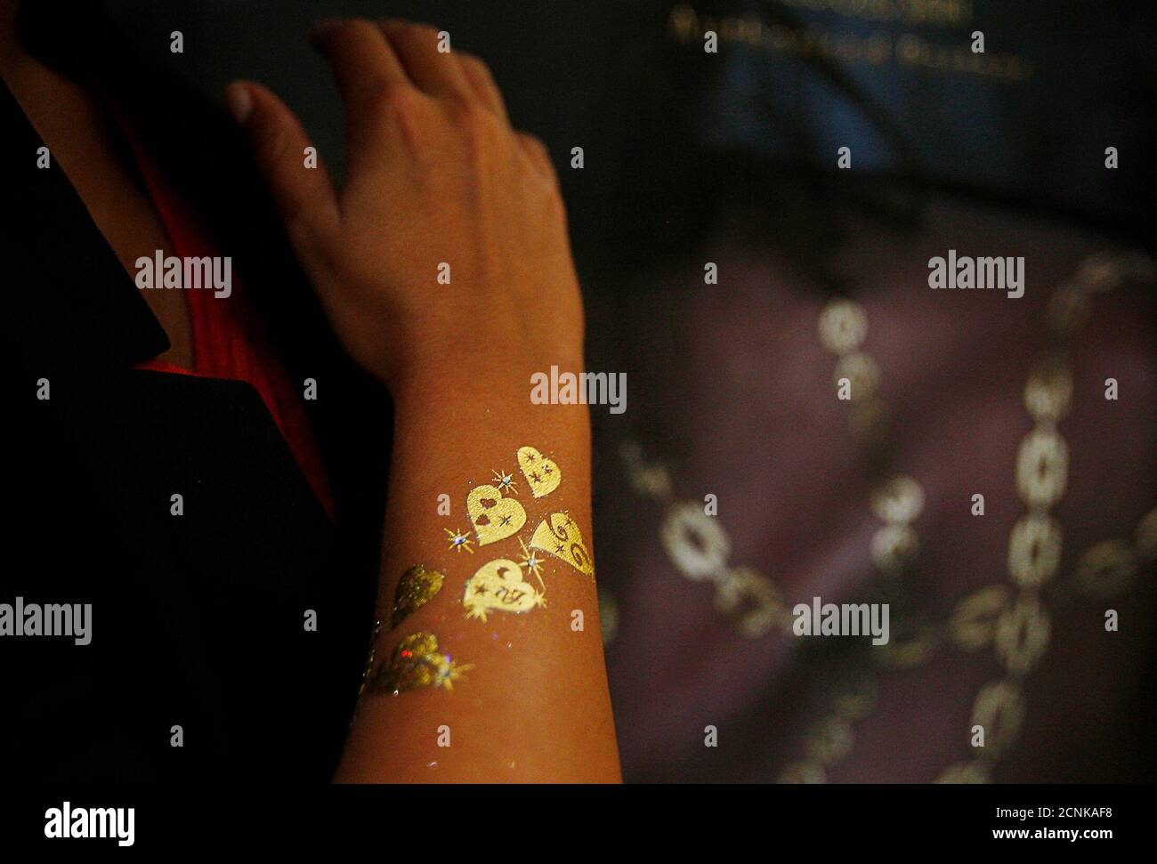 Gold Tattoo High Resolution Stock Photography And Images Alamy