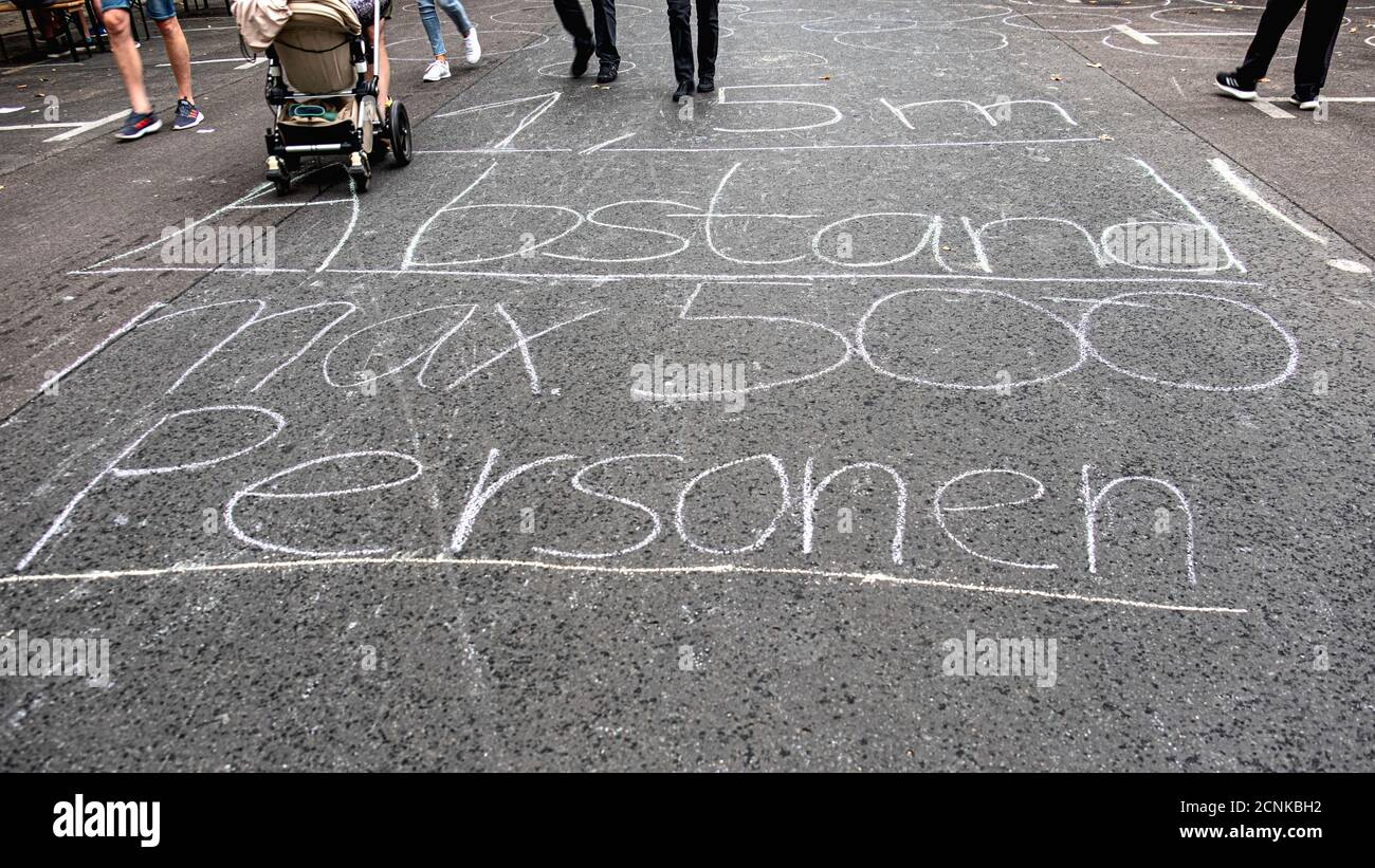 Berlin-Mitte. Veteranenstrassenfest, Veteran Street Party with chalk  markings on street for social distancing during COVID-19 pandemic Stock  Photo - Alamy