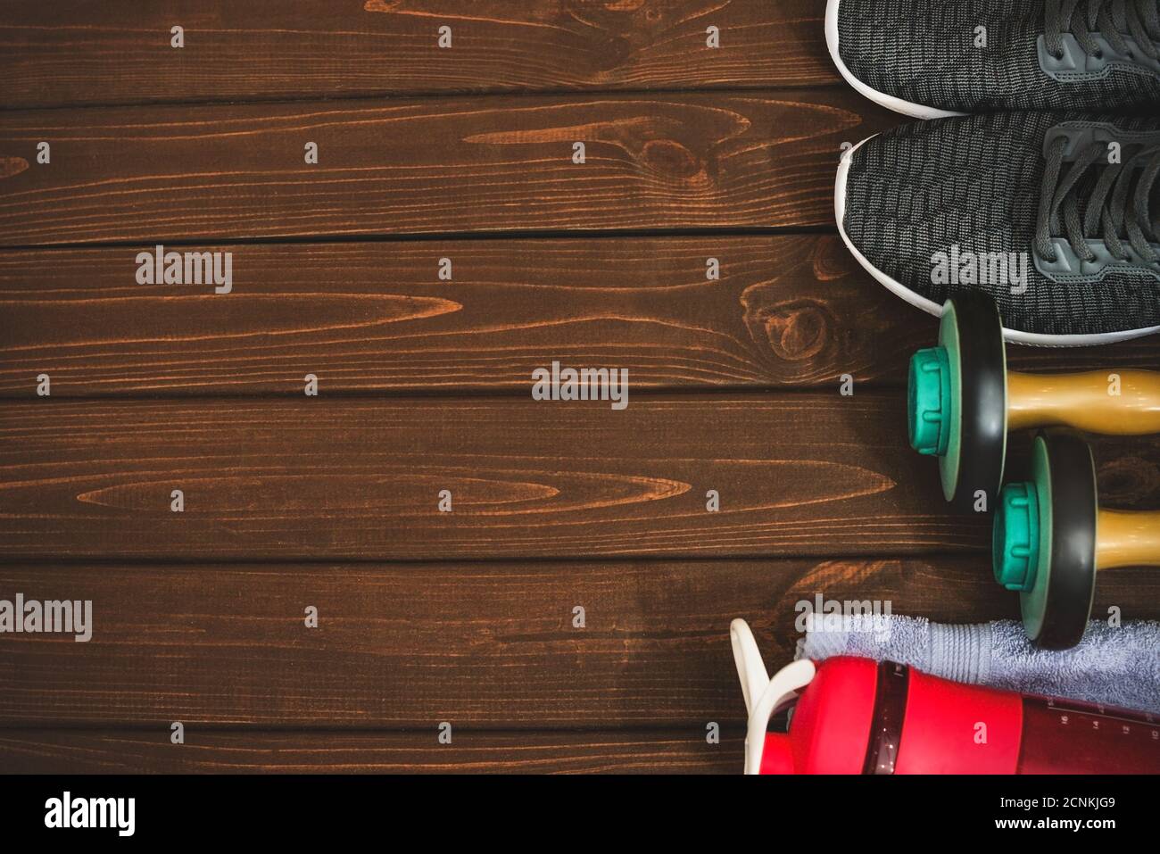 New life, sports paraphernalia on a wooden background, flat concept