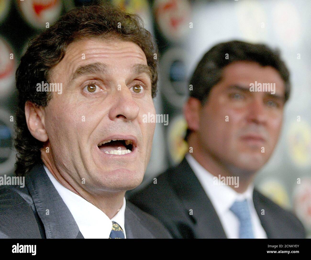 AMERICA NEW COACH ARGENTINE RUGGERI ANSWERS QUESTIONS DURING A PRESS  CONFERENCE AS PEREZ PRESIDENT OF THE CLUB AMERICA LOOKS ON. America' new  coach, Argentine Oscar Ruggeri (L) answers questions during a press