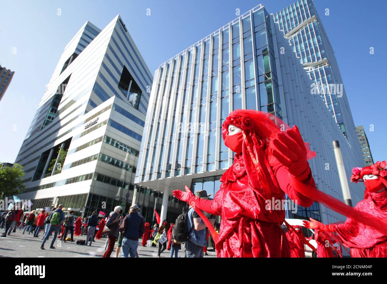 Amsterdam, Netherlands. 18th Sep, 2020. Extinction Rebellions Red Rebell activists protest at the Gustav Mahlerplein financial district amid the Coronavirus pandemic on September 18, 2020 in Amsterdam. Environmental protectors of Extinction Rebellion make a demonstration against the lobby of the large companies their influence on politics, climate and ecological crisis and this consequences and demand a citizen's assembly for a just climate policy.(Photo by Paulo Amorim/Sipa USA) Credit: Sipa USA/Alamy Live News Stock Photo