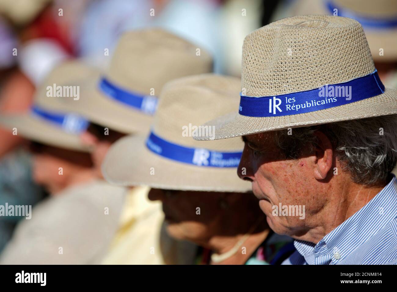 Supporters wear hats with the Les Republicains (LR) political party logo at LR's summer camp in La Baule, France, September 3, 2016. REUTERS/Stephane Mahe Stock Photo
