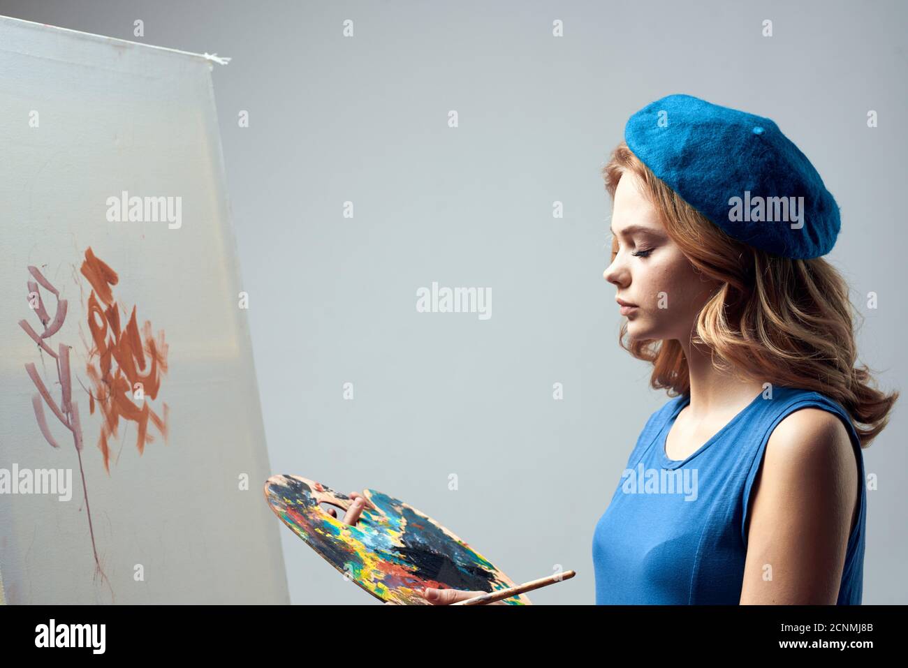 woman artist in blue beret palette easel drawing art creative hobby ...