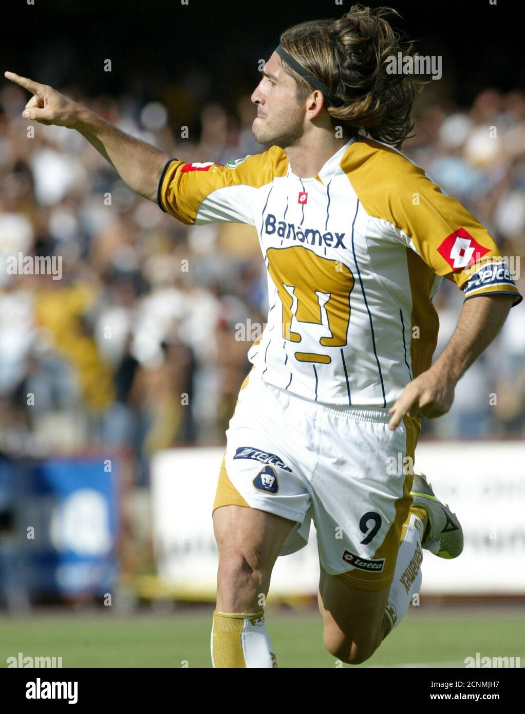 Argentine striker Bruno Marioni of Pumas celebrates his first goal against  Monterrey, during the first half of their Mexican league championship  soccer match at the University stadium in Mexico City, May 15,