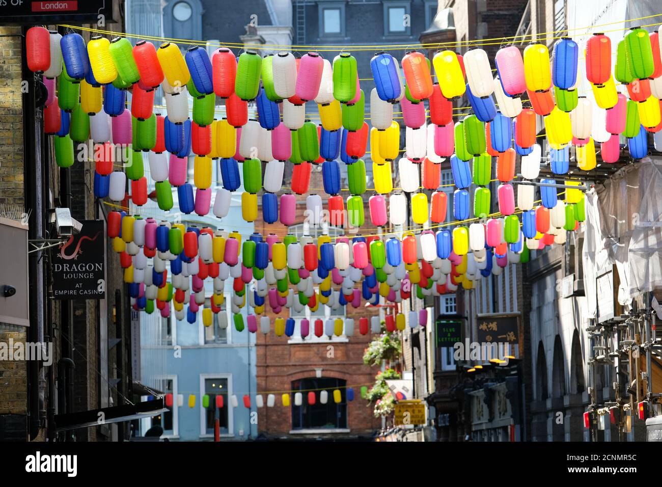 Chinatown, London, UK. 18th September 2020. The Love Chinatown campaign has multi-coloured lanterns replacing the traditional red lanterns as part of the campaign to revitalise the area. Credit: Matthew Chattle/Alamy Live News Stock Photo