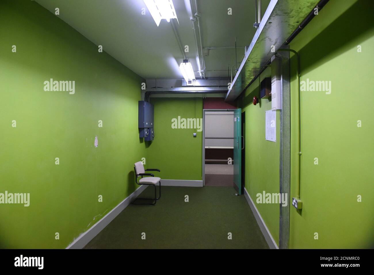 Corridor is seen in a former Regional Government HQ Nuclear bunker built by the British government during the Cold War which  has come up for sale in Ballymena, Northern Ireland on February 4, 2016. It is owned by the Office of Northern Ireland's First Minister and Deputy First Minister and capable of accommodating 236 personnel for extended periods. A large range of the original fixtures and fittings are to be included in the sale. It is believed to be one of the most technically advanced bunkers built in the UK with an array of advanced life support systems. In the event of a nuclear attack, Stock Photo