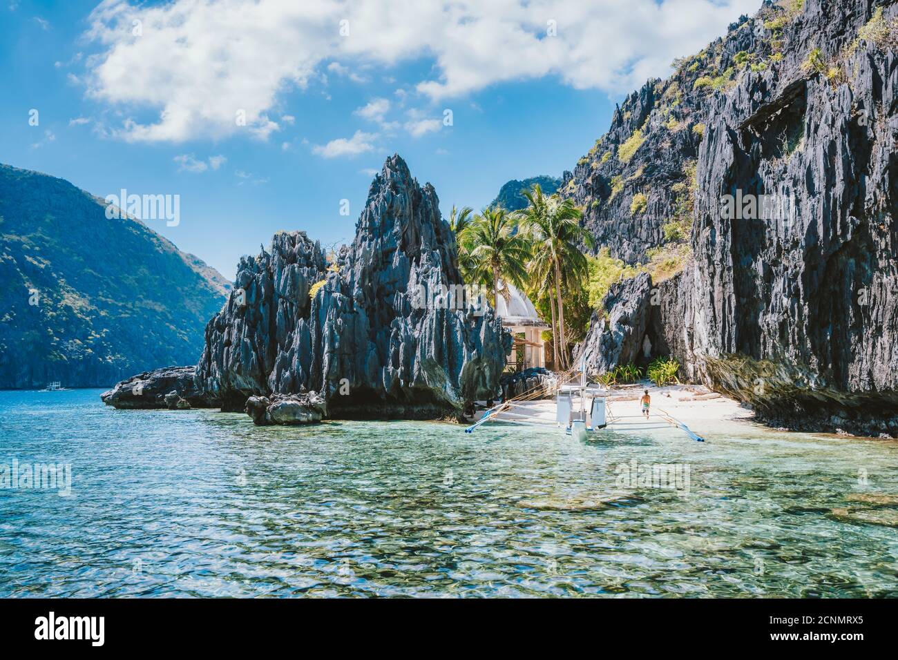 El Nido Palawan Philippines Asia. Banca boat at a small beach near the Matinloc Shrine. Trip highlights of Tour C. Stock Photo