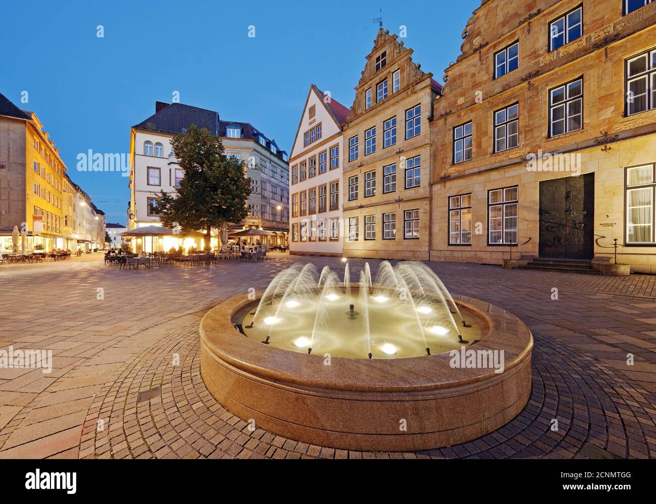 Old market with fountain and buerger houses in the evening, Bielefeld, Germany, Europe Stock Photo