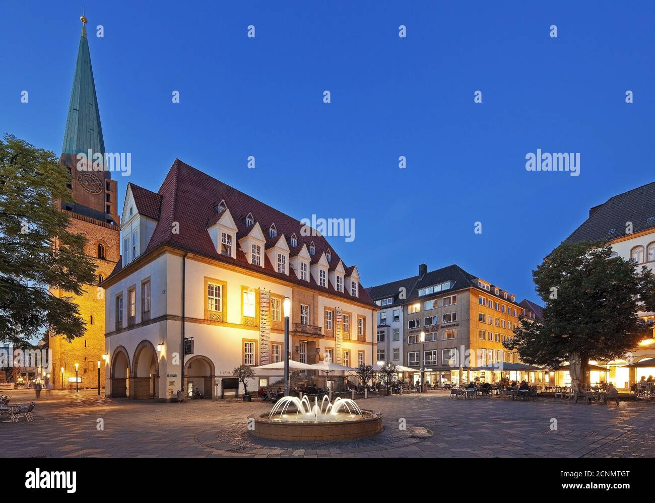 Old market with old town Nicolai church and theater TAM in the evening, Bielefeld, Germany, Europe Stock Photo