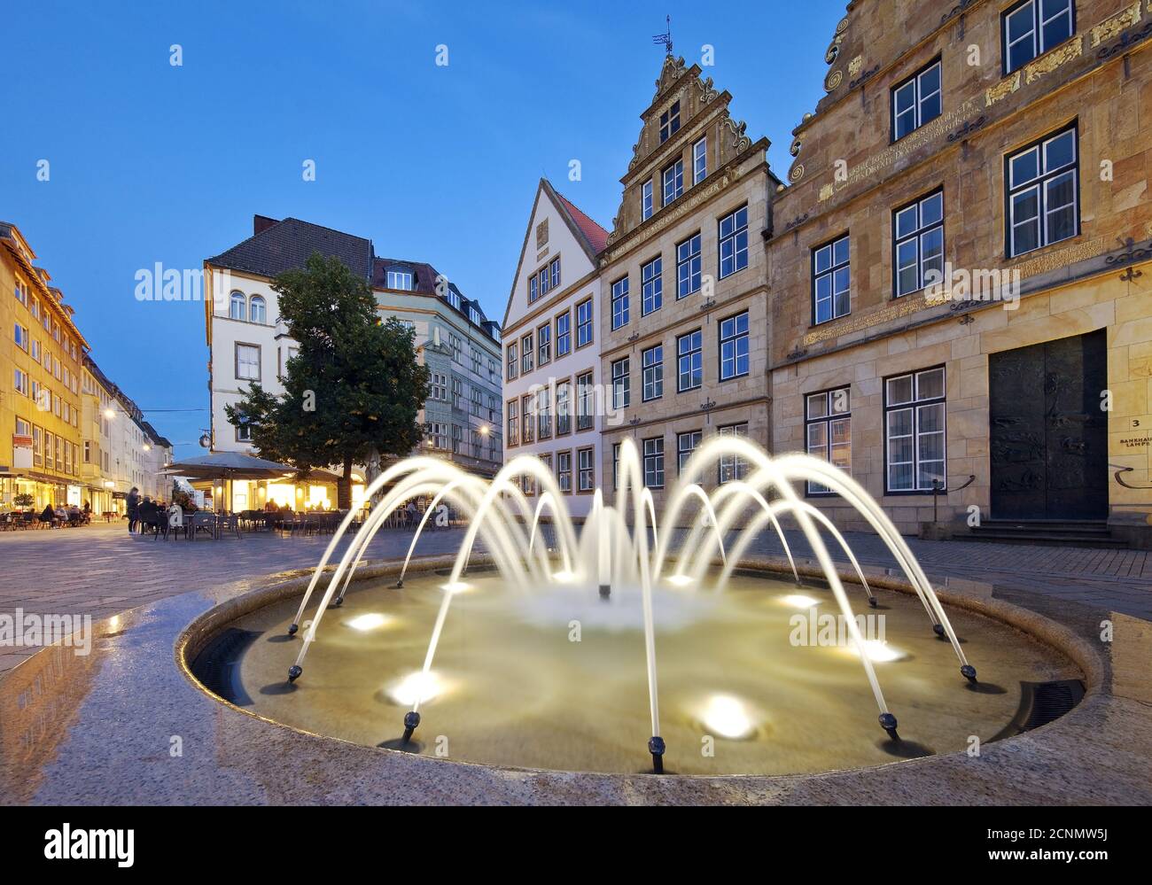 Old market with fountain and buerger houses in the evening, Bielefeld, Germany, Europe Stock Photo