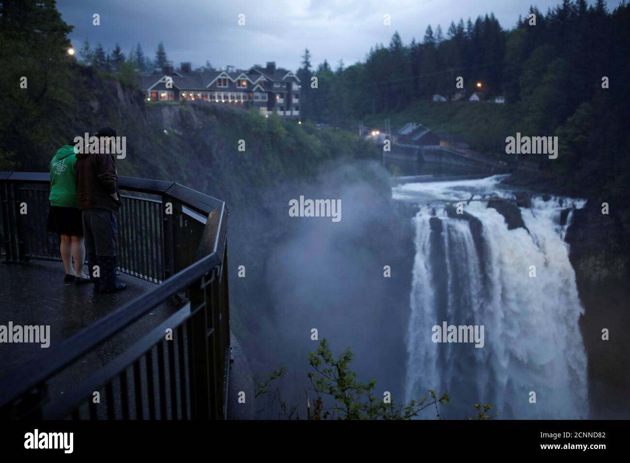 Sightseers View Snoqualmie Falls Adjacent To The Salish Lodge Spa Which Is Featured As The Great Northern Hotel In The Opening Sequence Of The Twin Peaks Series In Snoqualmie Washington U S