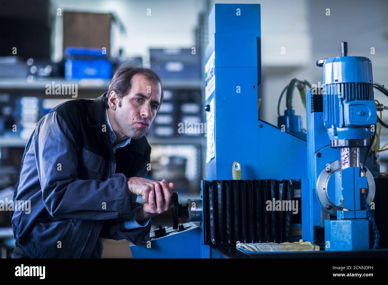 Engineering Checking Engineer checking equipment at an industrial plant, Germany Stock Photo ...