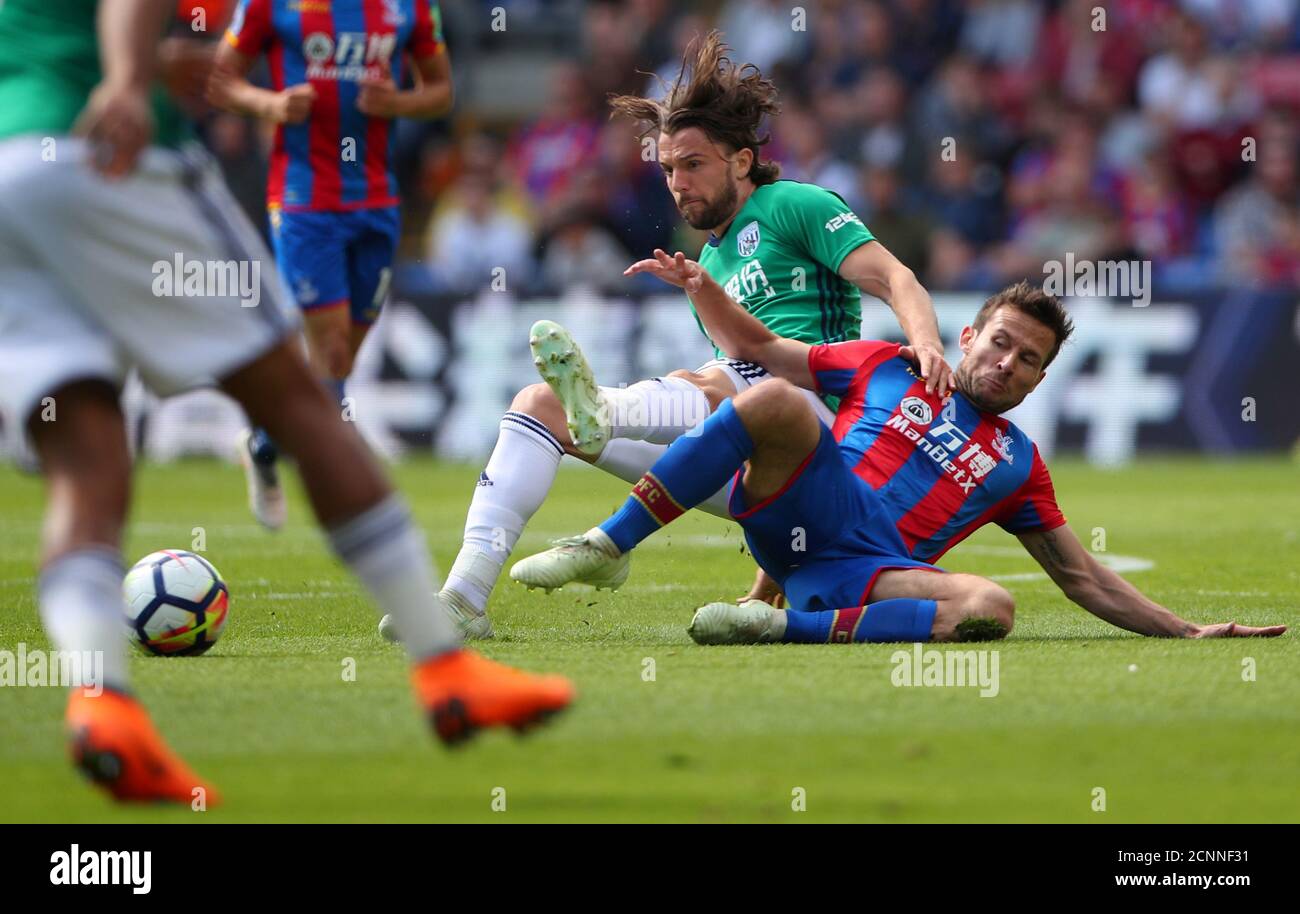 Soccer Football - Premier League - Crystal Palace vs West Bromwich Albion - Selhurst Park, London, Britain - May 13, 2018   West Bromwich Albion's Jay Rodriguez in action with Crystal Palace's Yohan Cabaye    REUTERS/Hannah McKay    EDITORIAL USE ONLY. No use with unauthorized audio, video, data, fixture lists, club/league logos or "live" services. Online in-match use limited to 75 images, no video emulation. No use in betting, games or single club/league/player publications.  Please contact your account representative for further details. Stock Photo