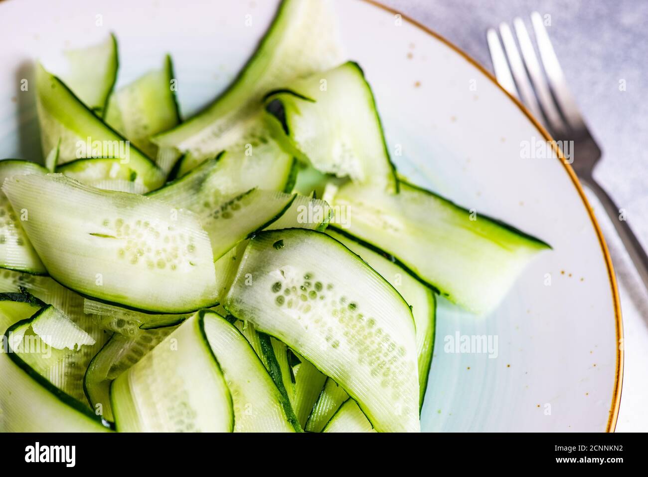 Close-up of cucumber salad on a plate Stock Photo