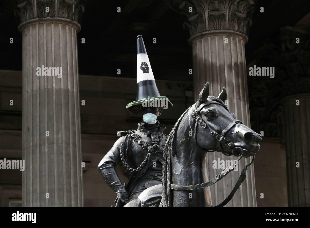 pix Duke Of Wellington Statue Glasgow Face Mask https www alamy com the equestrian statue of the duke of wellington with a traffic cone on his head and wearing a face mask is seen in glasgow in the aftermath of protests against the death of george floyd who died in police custody in minneapolis glasgow britain june 8 2020 reutersrussell cheyne image374804349 html