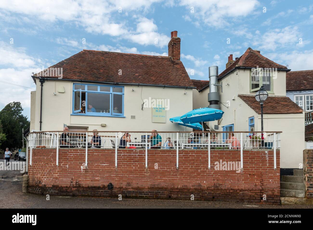 The Anchor Bleu harbourside pub or public house in Bosham village, West Sussex, UK Stock Photo