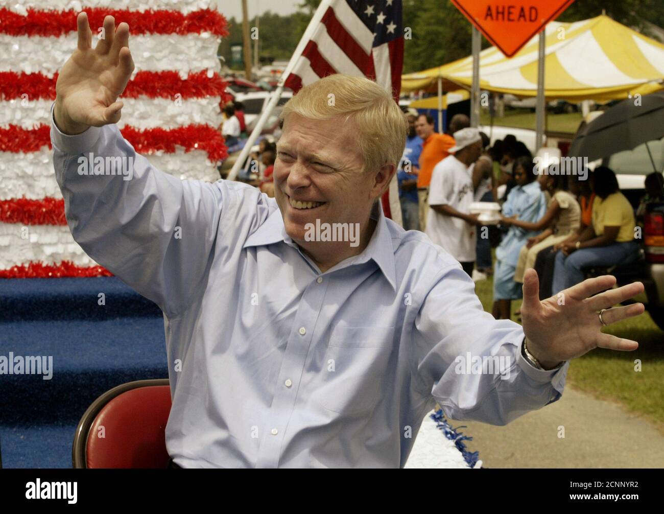 Democratic presidential hopeful Congressman Richard Gephardt of Missouri dances to the music as he rides past the Eastover, South Carolina bandstand on a float while serving as the Grand Marshall in the small town's parade May 3, 2003. Gephardt campaigned in Eastover before joining eight other Democratic presidential hopefuls later in the day in Columbia, South Carolina for the first candidates' debate of the 2004 U.S. presidential campaign. REUTERS/Jim Bourg  JRB Stock Photo