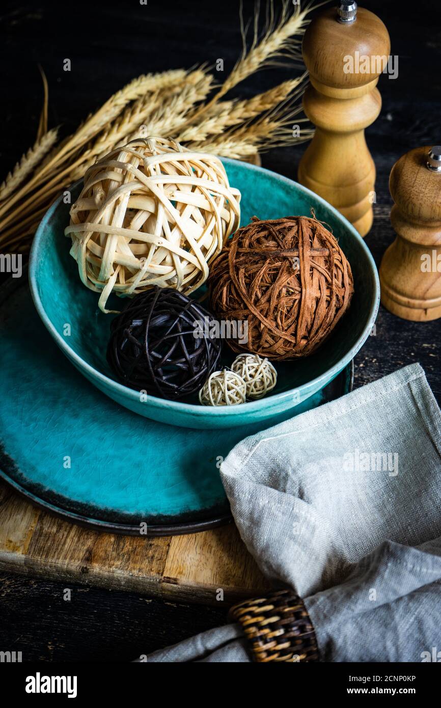 Rustic autumn table setting with ornamental balls Stock Photo