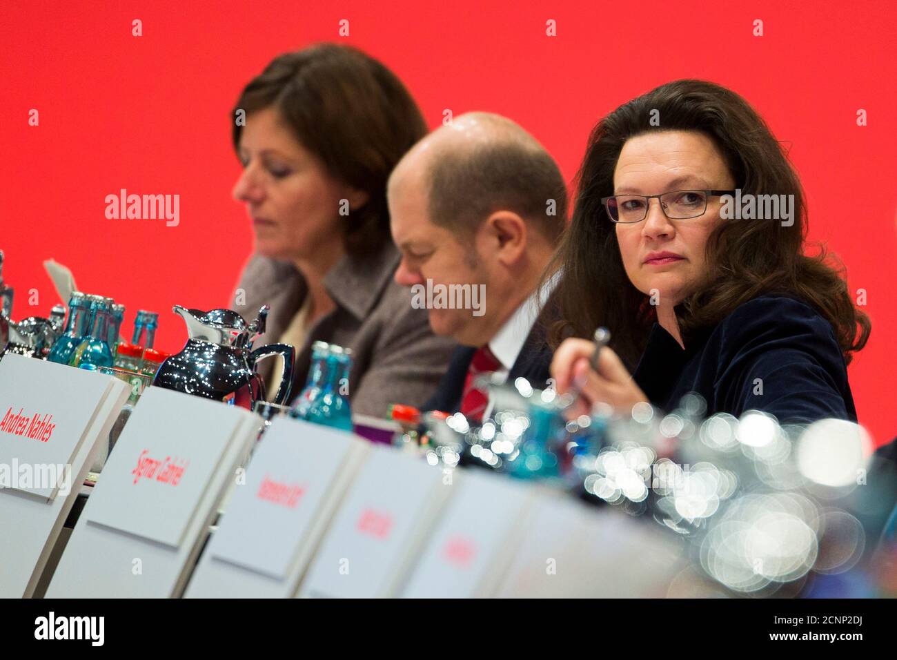 Secretary General of the Social Democratic Party (SPD)  Andrea Nahles, Hamburg Mayor Olaf Scholz (SPD) and Rhineland-Palatinate State Prime Minister Malu Dreyer (SPD) (R-L) attend a SPD party congress in Leipzig, November 15, 2013.   REUTERS/Thomas Peter (GERMANY - Tags: POLITICS) Stock Photo