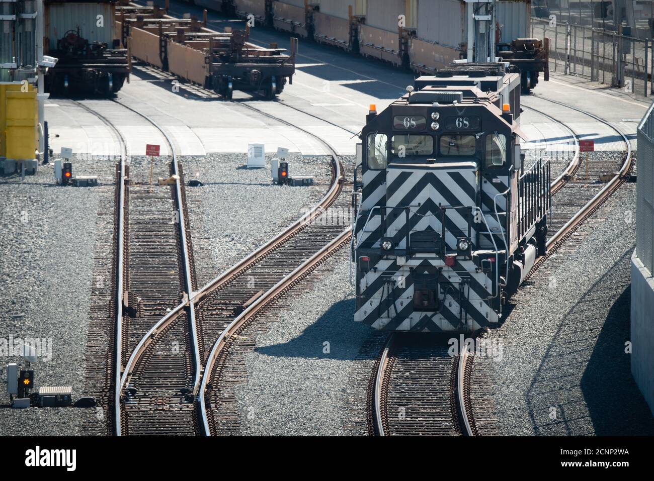 EMD SD70 road switcher diesel-electric locomotive in a rail yard, UNSA Stock Photo