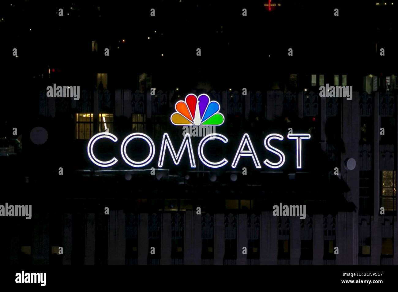 The NBC and Comcast logo are displayed on top of 30 Rockefeller Plaza, formerly known as the GE building, in midtown Manhattan in New York July 1, 2015. Comcast Corp, the owner The NBC and Comcast logo are displayed on top of 30 Rockefeller Plaza, formerly known as the GE building, in midtown Manhattan in New York July 1, 2015. Comcast Corp, the owner