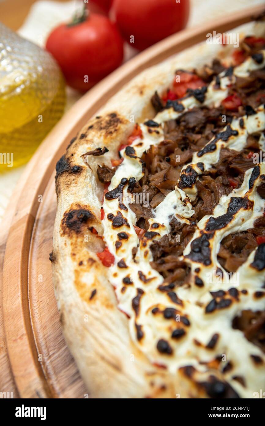 Shimeji mushroom and cream cheese pizza and cooking ingredients