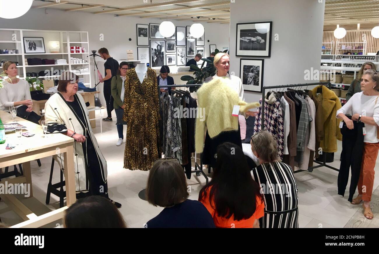 Maria Ostblom, head of womenswear design at H&M, gives a presentation to  invitees at a customer event at an H&M test store in Stockholm, Sweden June  30, 2018. Picture taken June 30,