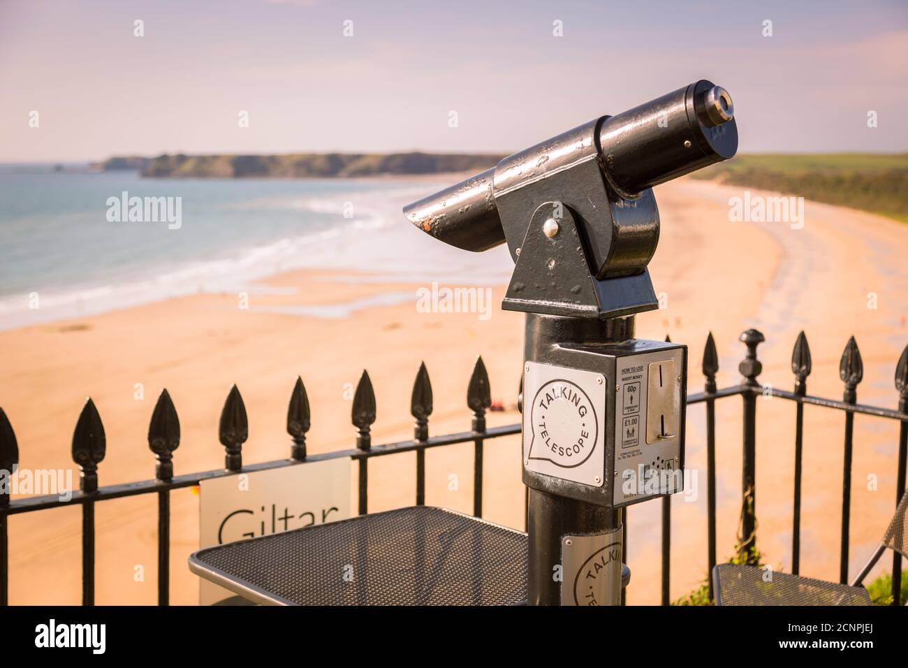 Coin operated telescope, Tenby esplanade, Pembrokeshire, Wales, UK Stock Photo