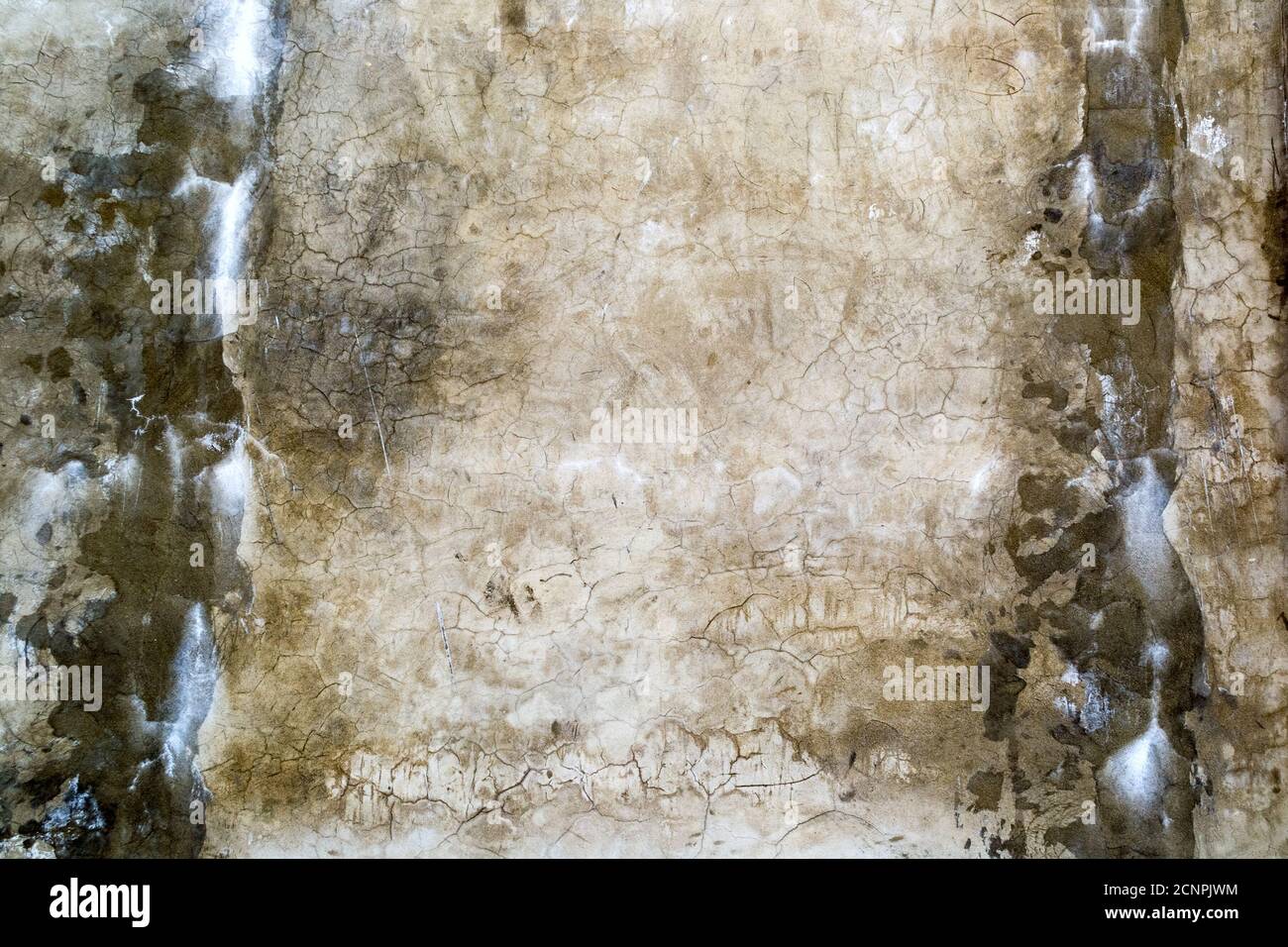 Aged old dirty concrete cracked wall texture or background Stock Photo