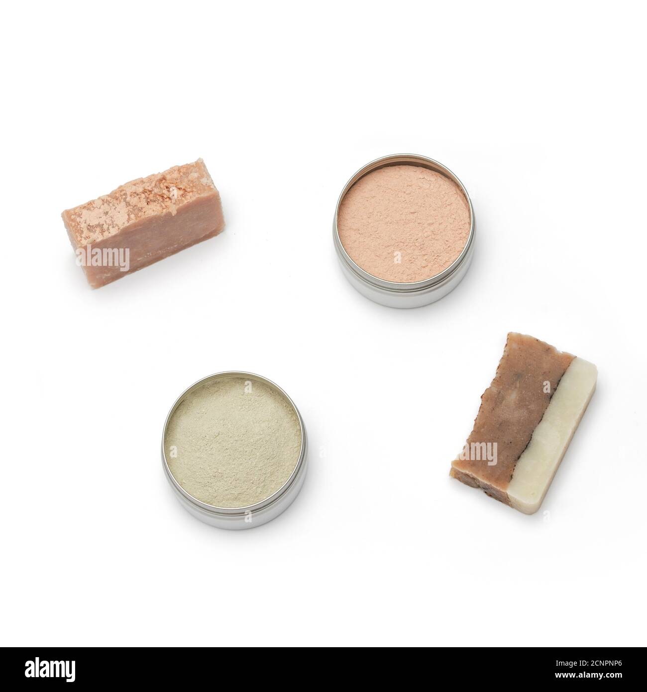 Background with ingredients for the production of cosmetics. Green and pink clays, handmade soap. Natural cosmetics concept. Stock Photo