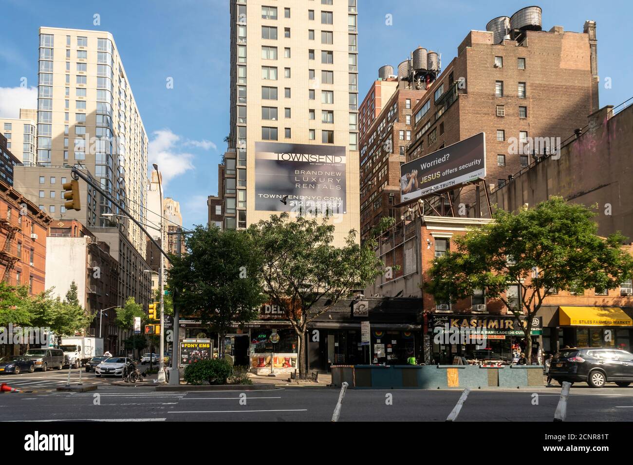 A sign advertising luxury apartment rentals on a building in the Hell’s